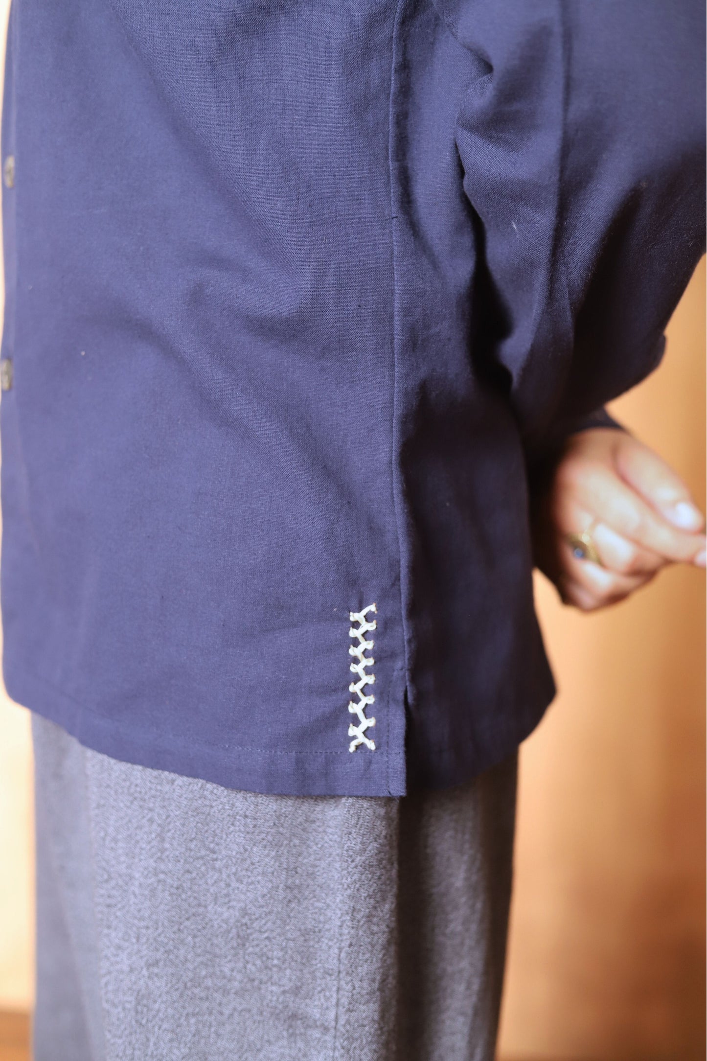 Navy blue jacket with a blurred background