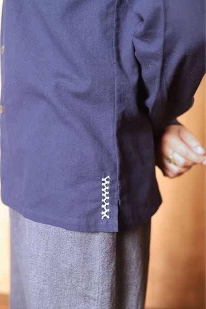 Navy blue jacket with a blurred background
